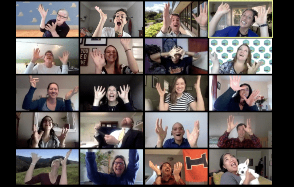 Screenshot of participants smiling on a zoom call.